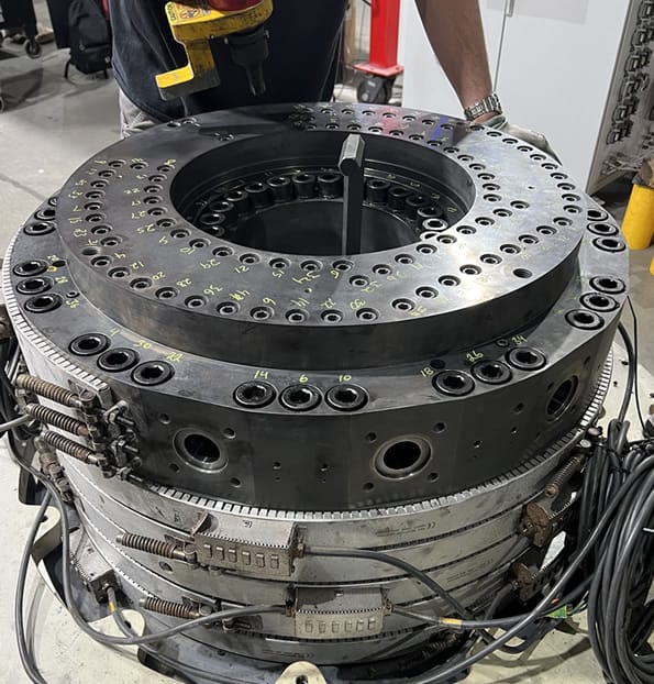 Photo of bolts on a die