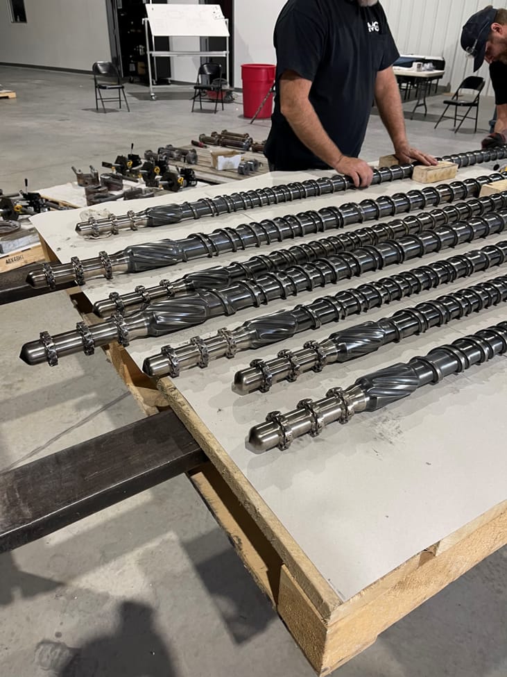 Photo of screws on a workbench.